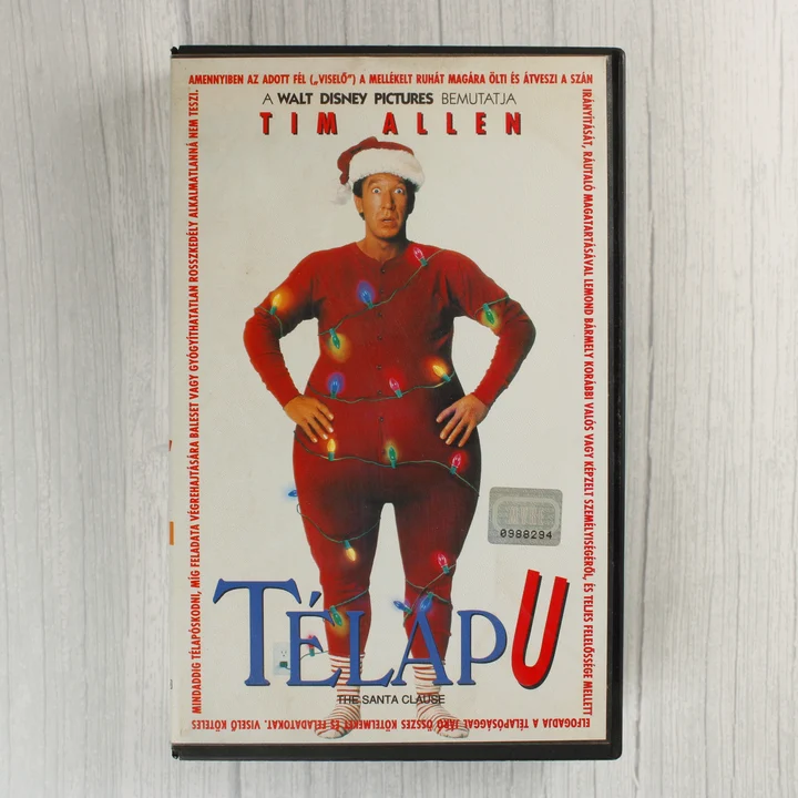 A Télapu című film VHS kazettájának elülső borítója Tim Allen képével.