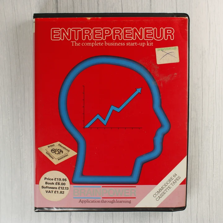 Az Entrepreneur Commodore 64 szoftver piros borítós tokja elölről