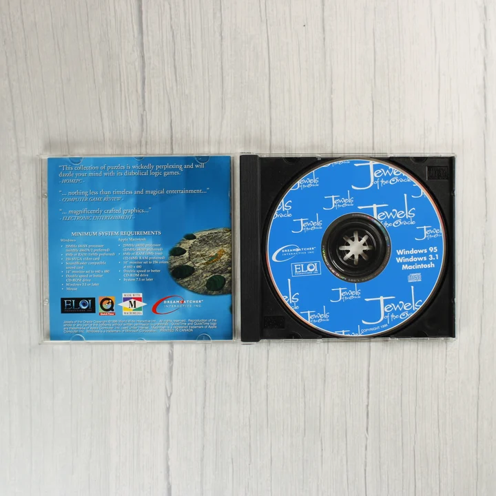 Nyitott CD-tok a Jewels of the Oracle játéklemezzel