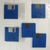 Öt darab kék Amiga floppy lemez a Hits for Six válogatásból