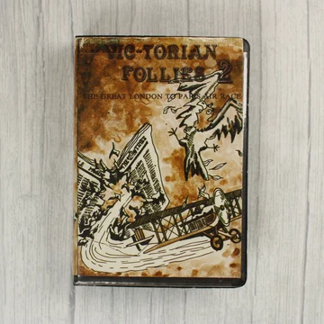 Vic-Torian Follies 2 videójáték borítója barna tónusú grafikával