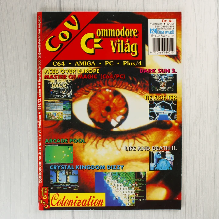 A Commodore Világ magazin 51. számának színes borítója egy nagy szemmel.