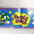 Kétoldalas illusztráció a Bubble Bobble videójáték karaktereivel.