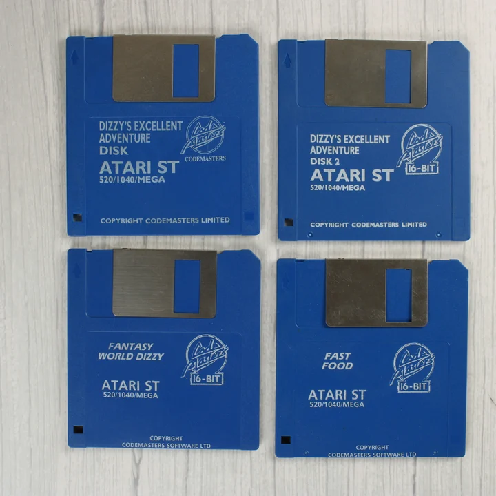 Négy darab kék Atari ST floppy lemez a Dizzy játékokkal