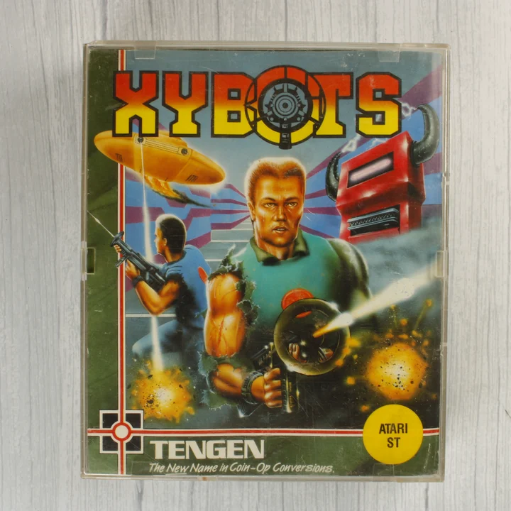 A Xybots videójáték elülső borítója műanyag tokban