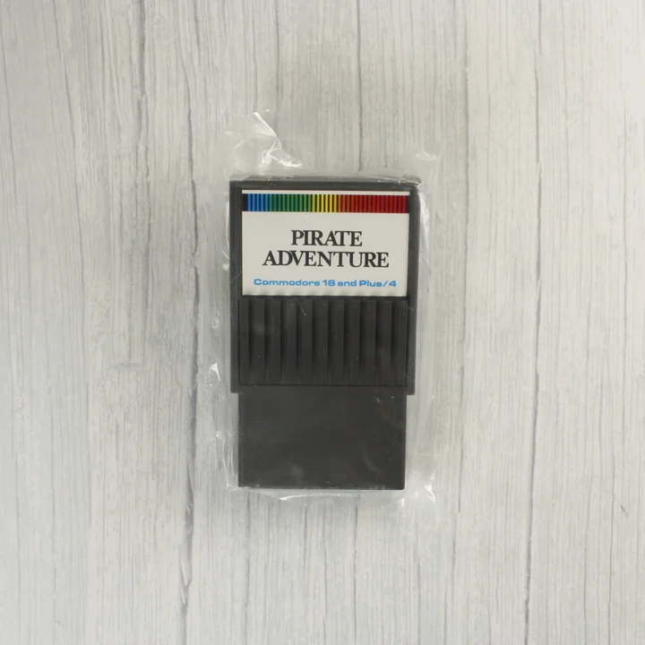 Fekete Pirate Adventure cartridge műanyag védőfóliában.