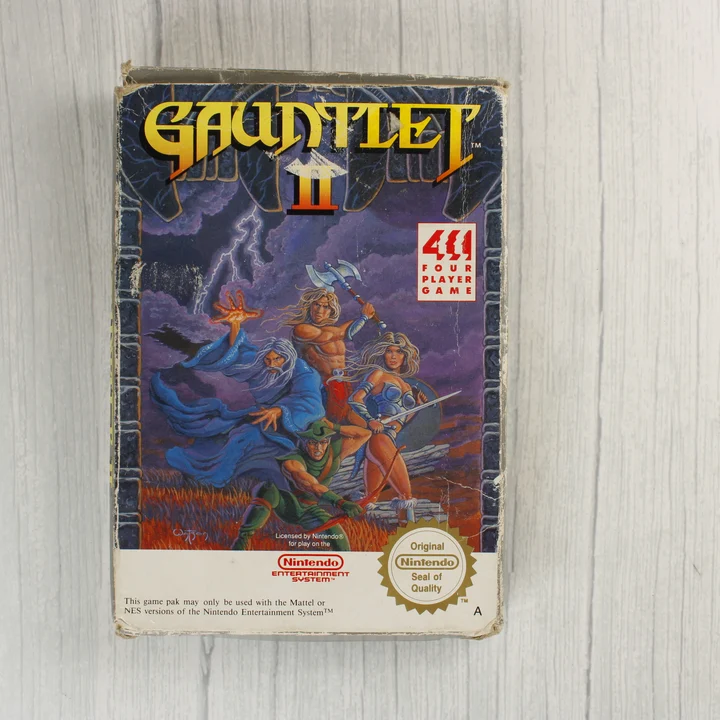 A Gauntlet II NES játék dobozának előlapja fantasy karakterekkel