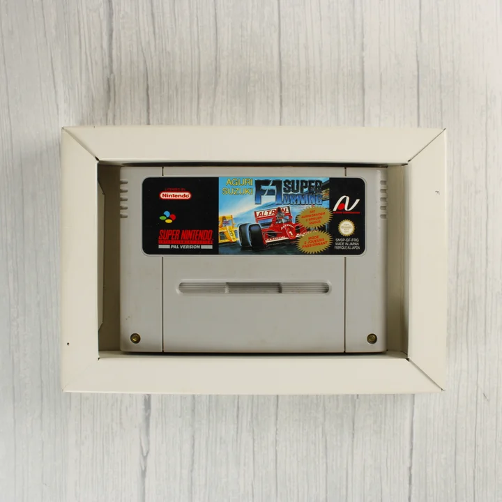 Aguri Suzuki F-1 Super Driving SNES cartridge a belső tartóban