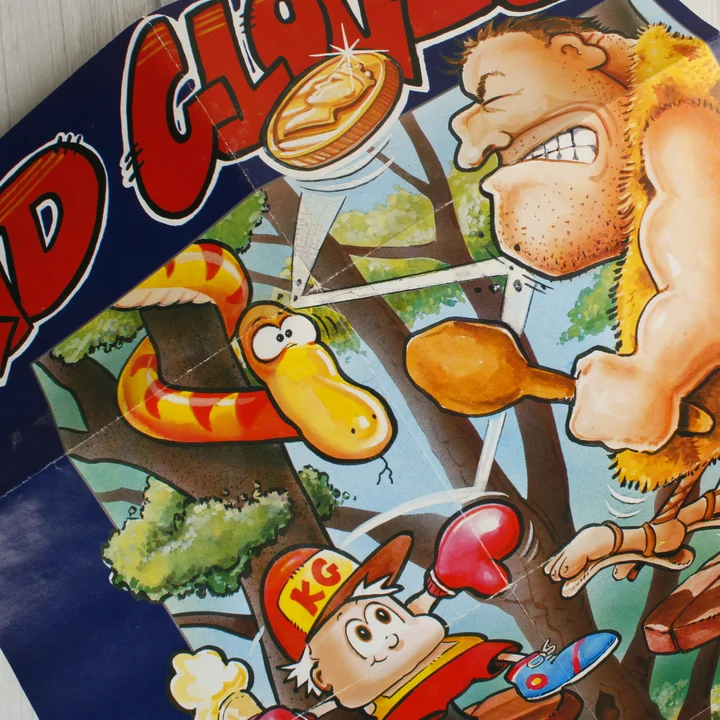 Közeli kép a Kid Gloves játékhoz mellékelt színes poszterről.