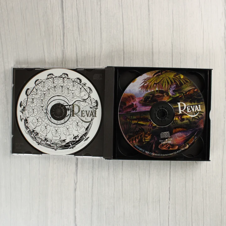 A másik két CD-ROM lemez a nyitott tokban.