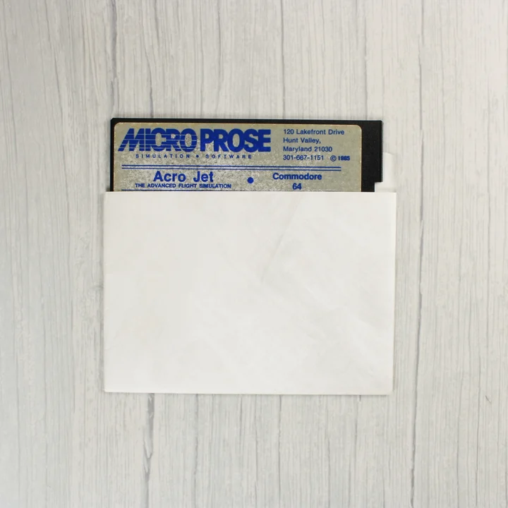 Acro Jet 5,25 colos floppy lemez Commodore 64-hez fehér papírtokban