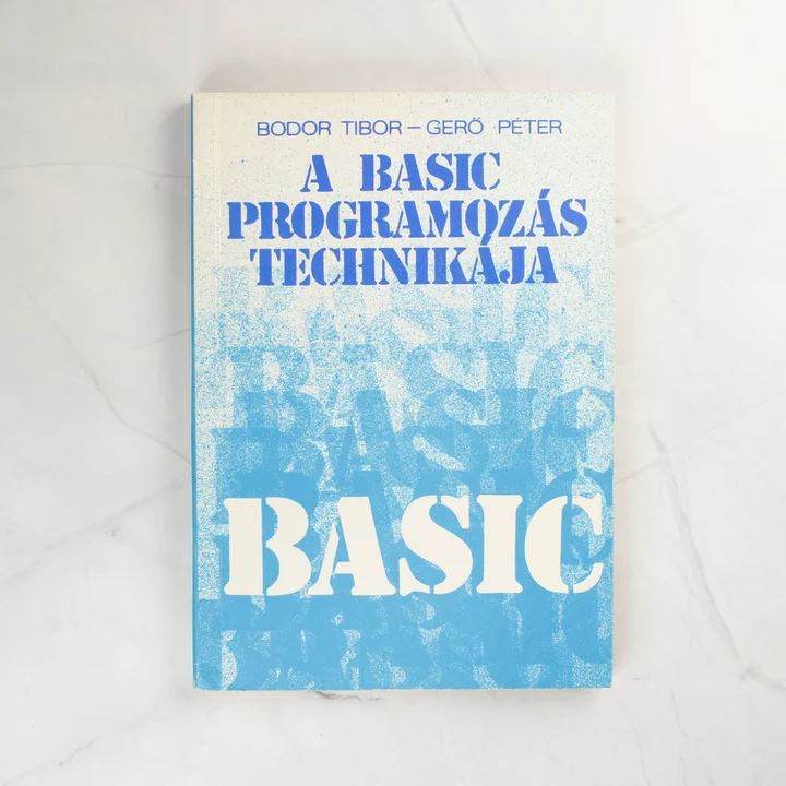 A BASIC programozás technikája borító A BASIC programozás technikája könyv kék-fehér borítója