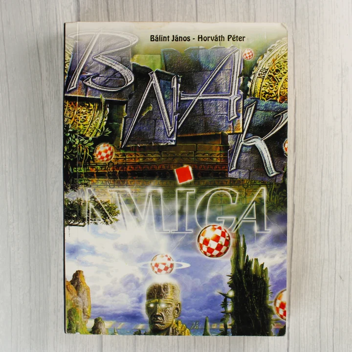 A B.N.A.K. #1 Amiga könyv színes, szürreális grafikával díszített első borítója.