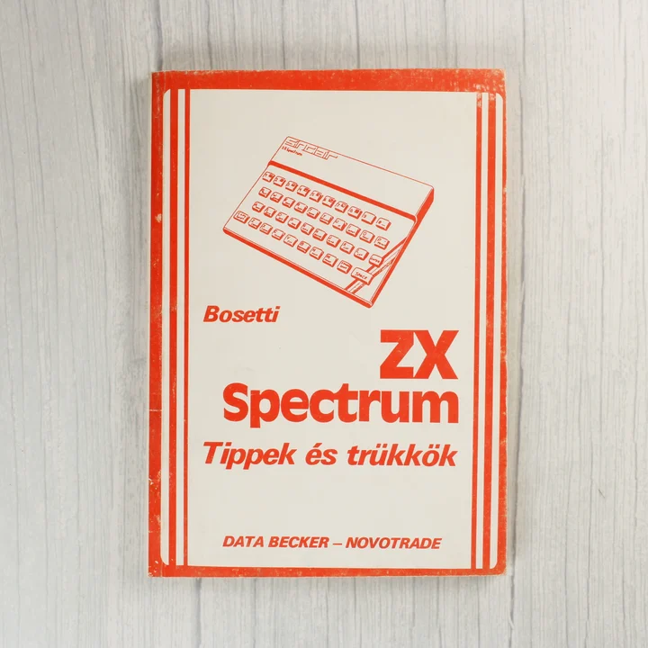 A ZX Spectrum Tippek és trükkök könyv piros-fehér borítója