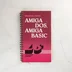 Mészáros László Amiga DOS, Amiga BASIC könyvének sötétrózsaszín borítója spirálkötéssel.