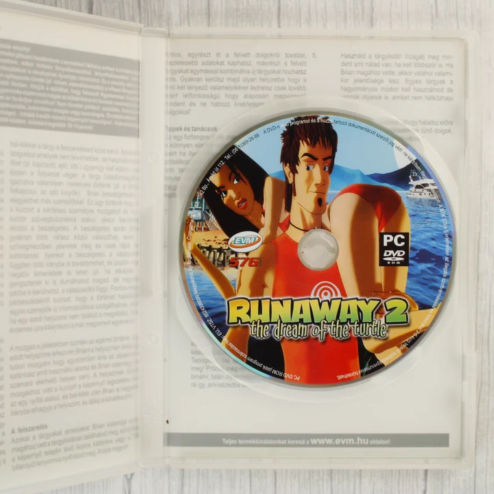 A Runaway 2 nyitott tokja a lemezzel és az útmutatóval