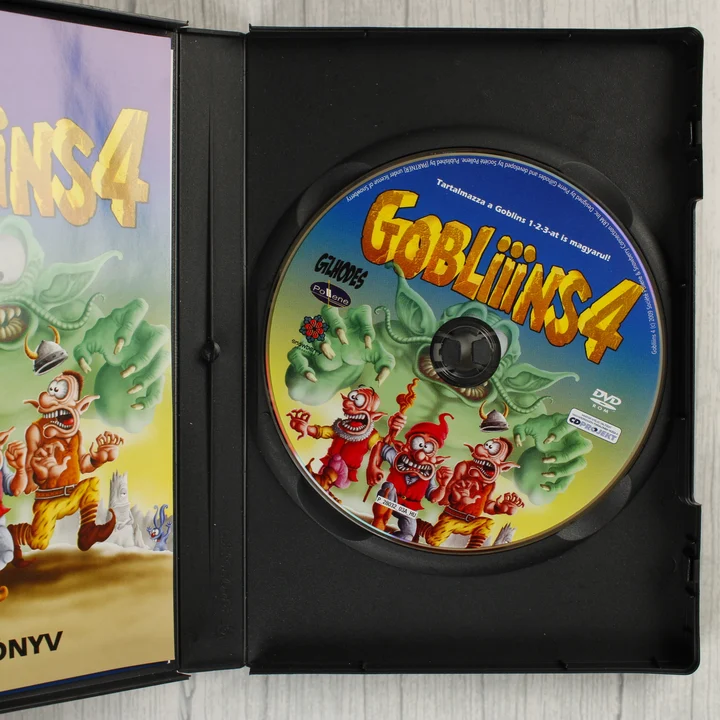 Gobliiins 4 PC lemez Gobliiins 4 nyitott DVD-tok a lemezzel és a kézikönyvvel