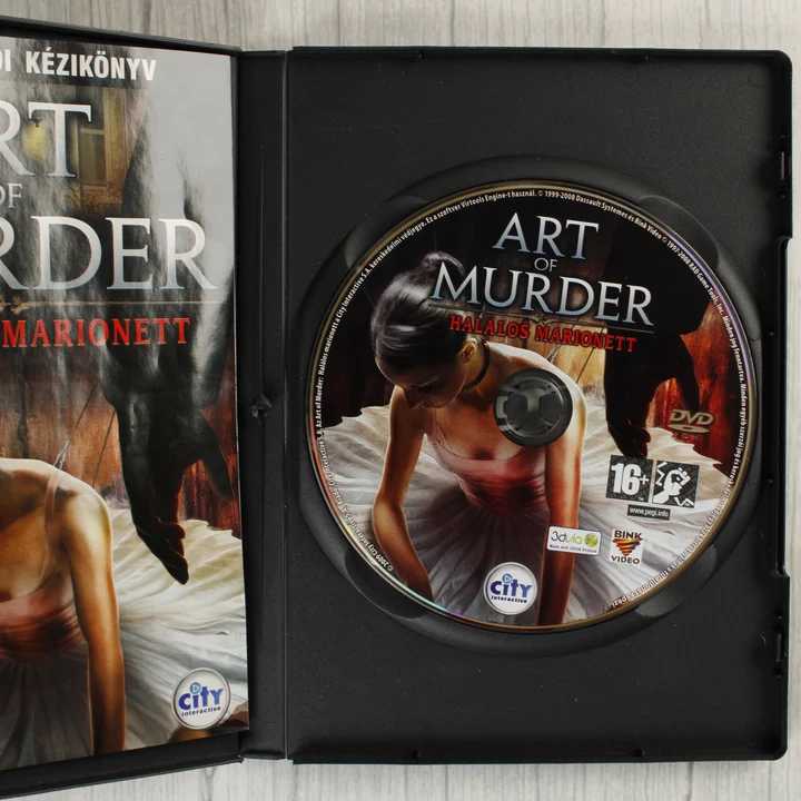 Art of Murder: Halálos Marionett belső tartalom Art of Murder: Halálos Marionett nyitott tok lemezzel és kézikönyvvel