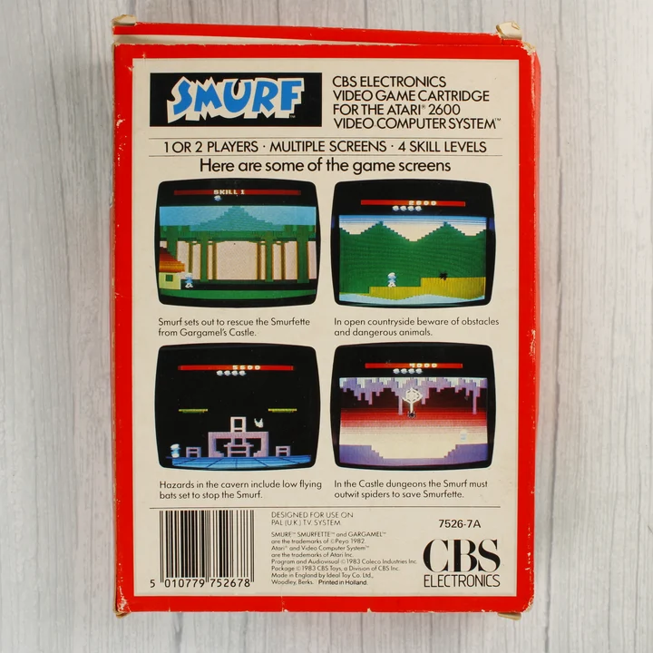 Smurf Atari 2600 doboz hátoldal A Smurf videójáték dobozának hátoldala képernyőfotókkal