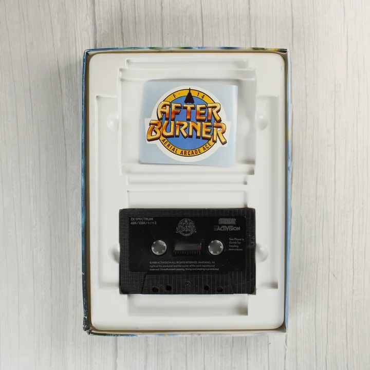After Burner kazetta és tartozékok After Burner ZX Spectrum kazetta és matrica a belső tálcában