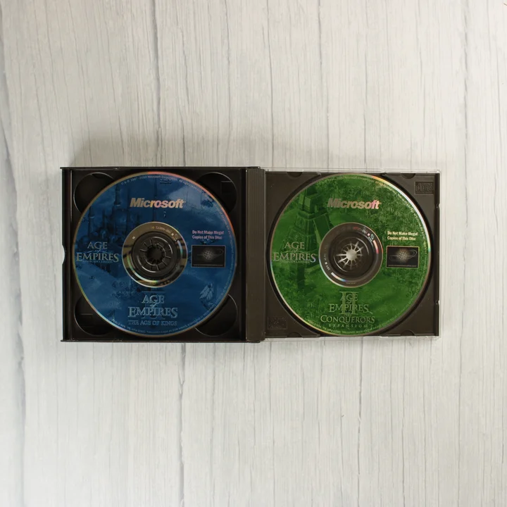 Age of Empires II és The Conquerors CD-k műanyag tokban