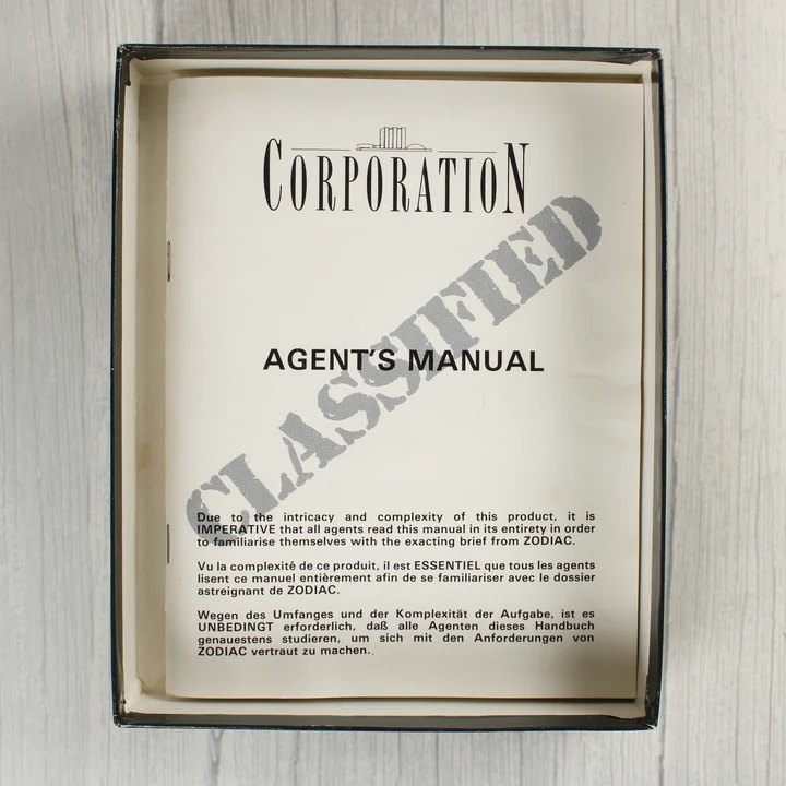 A Corporation videójáték Agent's Manual kézikönyve a dobozban