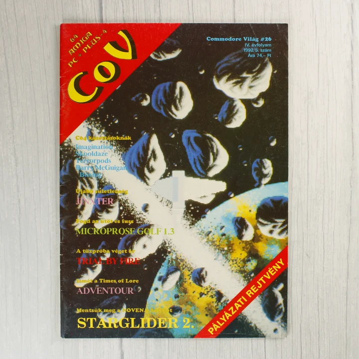 A Commodore Világ 26. számának színes borítója űrbéli grafikával.