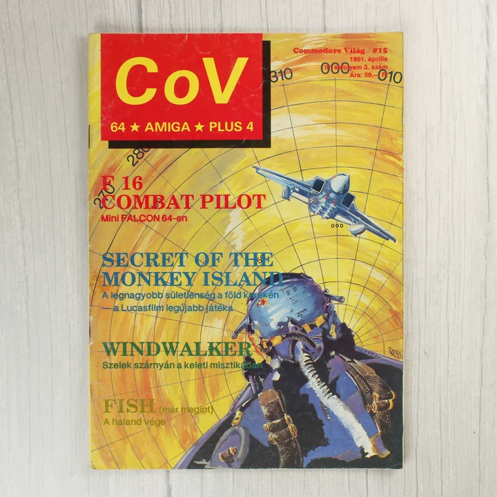 A Commodore Világ 15. számának színes borítója egy pilótával és egy repülővel.