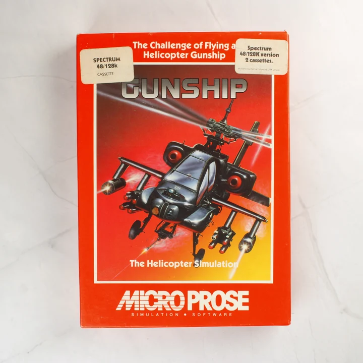 A Gunship videójáték piros dobozának előlapja egy helikopterrel