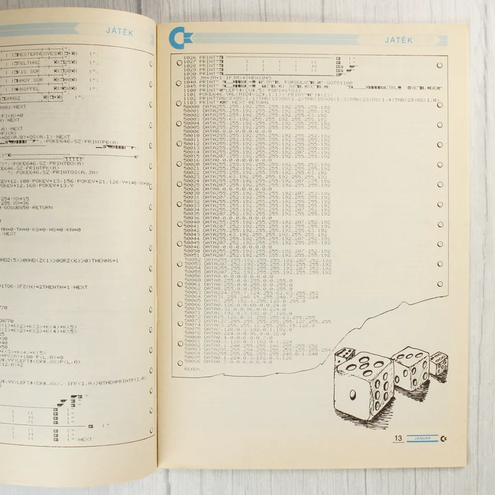 A Commodore újság belső oldala programkóddal és dobókockás illusztrációval