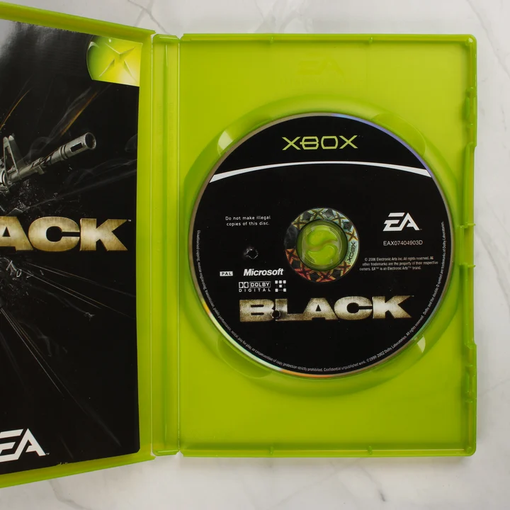 Nyitott Xbox tok a Black játéklemezzel