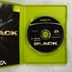 Nyitott Xbox tok a Black játéklemezzel