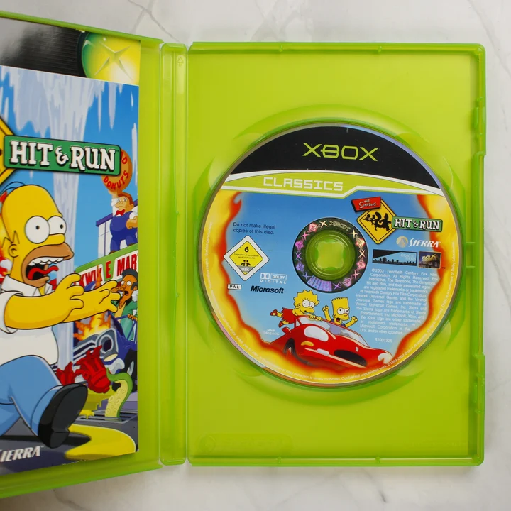 The Simpsons Hit & Run Xbox Classics nyitott tok a lemezzel és az útmutatóval