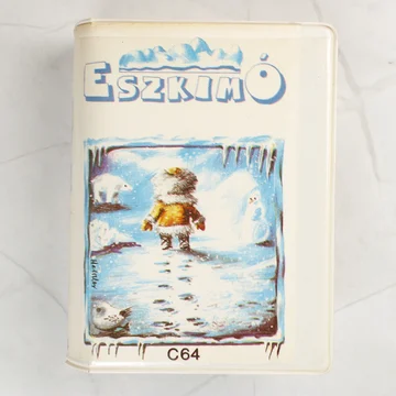 Az Eszkimó Commodore 64 játék elülső borítója fehér műanyag tokban.
