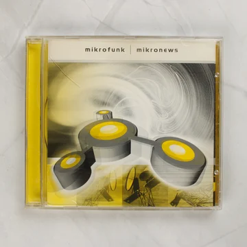 Mikrofunk Mikronews CD elülső borítója sárga és szürke grafikával