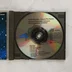 A nyitott CD-tok a lemezzel