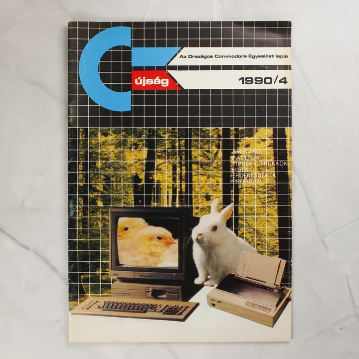 A Commodore újság 1990/4-es számának címlapja egy számítógéppel és egy fehér nyúllal.