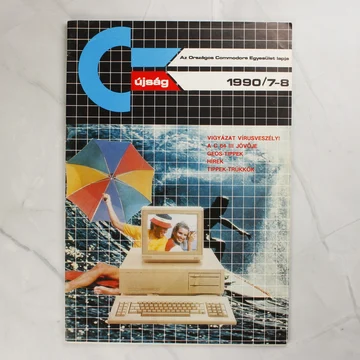 A C-újság 1990 július-augusztusi számának színes borítója egy Commodore számítógéppel.