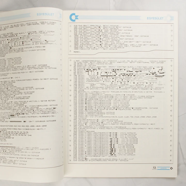 A C-újság belső oldala programkód listázással.