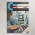 A C-újság 1992/1-es számának színes borítója egy Commodore számítógéppel.