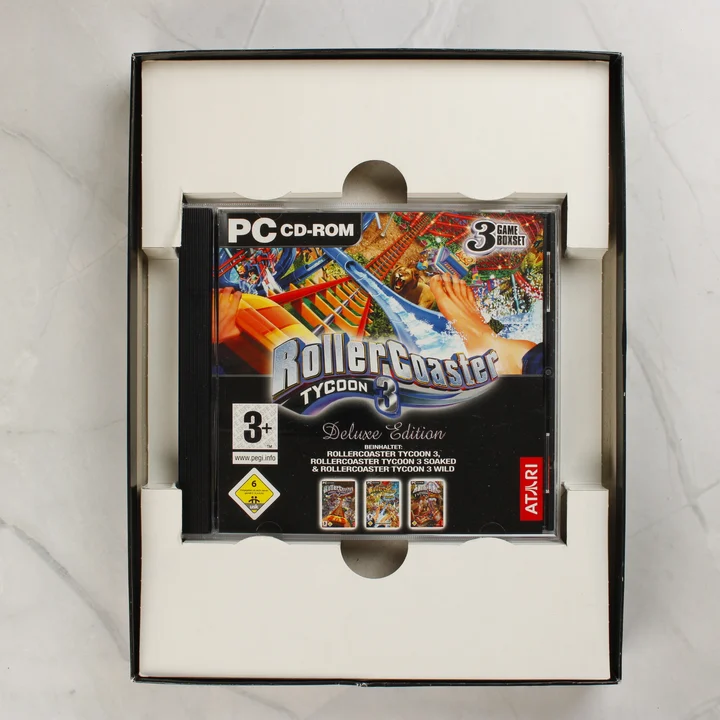 RollerCoaster Tycoon 3 Deluxe Edition nyitott doboz belső tartóval