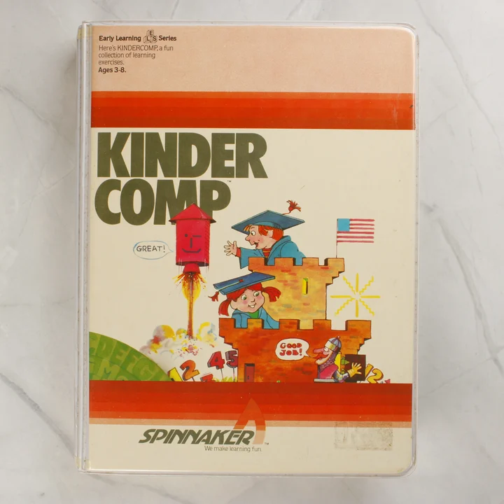 A Kindercomp videójáték elülső borítója színes grafikával.