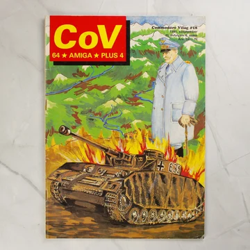 A Commodore Világ 18. számának címlapja egy égő tankkal és egy tiszttel.