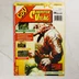 A Commodore Világ magazin 53. számának színes borítója egy hüllőszerű lénnyel.