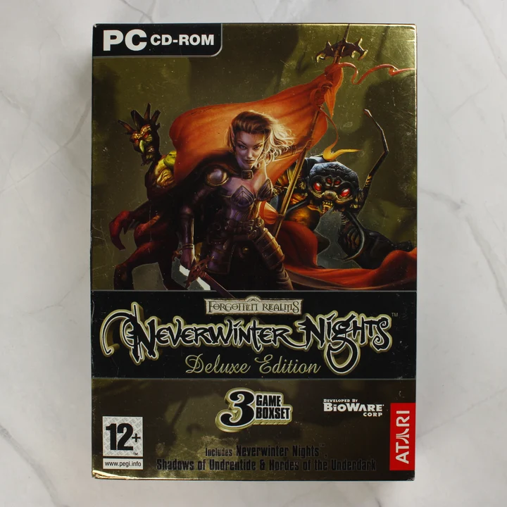 Neverwinter Nights Deluxe Edition díszdoboz Neverwinter Nights Deluxe Edition PC játék arany díszdobozának előlapja