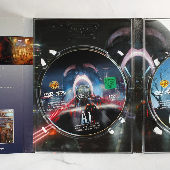 A film lemeze a nyitott DVD tokban