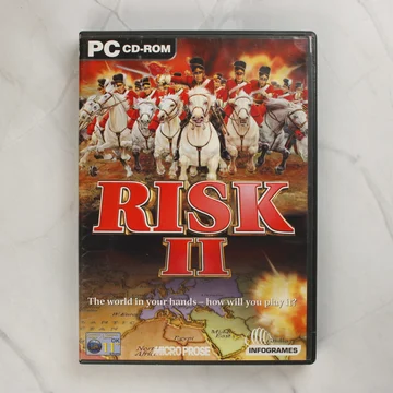 Risk II PC videójáték előlapja lovas katonákkal