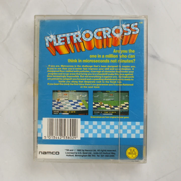 Metro-Cross Commodore 64 játék kazetta tokban hátulnézetből