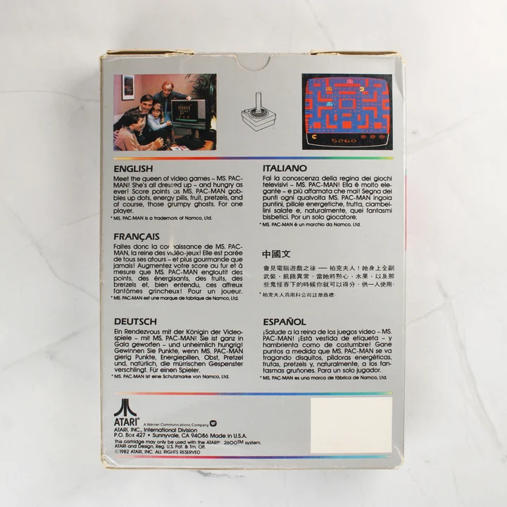 Ms. Pac-Man Atari 2600 videójáték dobozának hátoldala többnyelvű leírással