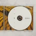 Nyitott CD-tok a Camel Rajaz lemezzel